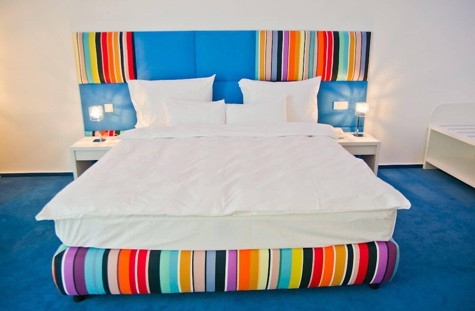 Marshal Garden Hotel Bukurešť Exteriér fotografie A bed
